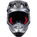 Introducing the stylish Supertech S-M10 Helmet Flood Silver/Black/Orange Fluoro Matte/Gloss from Crown Kiwi Enterprises Limited. This motocross helmet boasts a sleek design with black and silver tones, accented by vivid orange highlights and adorned with a star logo. Its aerodynamic structure includes a prominent visor and efficient venting system, making it an excellent choice for enhancing both safety and style in off-road biking.