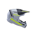 This side view features the S-M3 Youth Helmet in gray with black and yellow fluoro matte accents. Designed by Crown Kiwi Enterprises Limited, this stylish youth helmet incorporates a lightweight design that includes their logo and name. It offers impact protection for safety, complete with a visor and chin guard for optimal coverage.