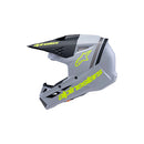 This side view features the S-M3 Youth Helmet in gray with black and yellow fluoro matte accents. Designed by Crown Kiwi Enterprises Limited, this stylish youth helmet incorporates a lightweight design that includes their logo and name. It offers impact protection for safety, complete with a visor and chin guard for optimal coverage.