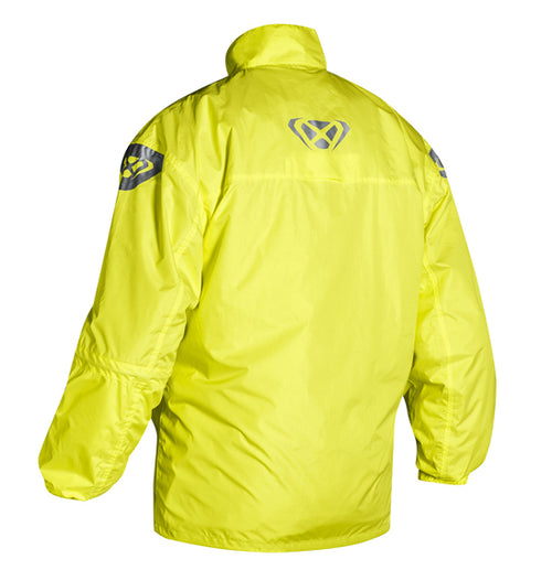 An Ixon MADDEN Jacket in bright yellow and black is shown from the back, featuring a high collar and long sleeves. Reflective prints are visible on the shoulders, with a larger IXON logo displayed on the upper back. The material appears to be lightweight, waterproof, and breathable.