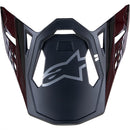 The Visor S-M10 22.06 Fame by ALPINESTARS is a matte black and maroon motorcycle helmet visor with an angular design, cut-out sections, and a gray star logo at the center. Geometric patterns on the sides and a carbon finish enhance its dynamic, modern appeal.
