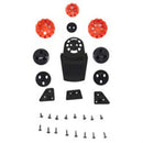 A selection of black and orange plastic components and screws arranged symmetrically, including round orange pieces, circular black parts with holes, wedges, and numerous small metal screws. This set is perfect for the Visor Connection Kit S-M10/8 by Crown Kiwi Enterprises Limited.