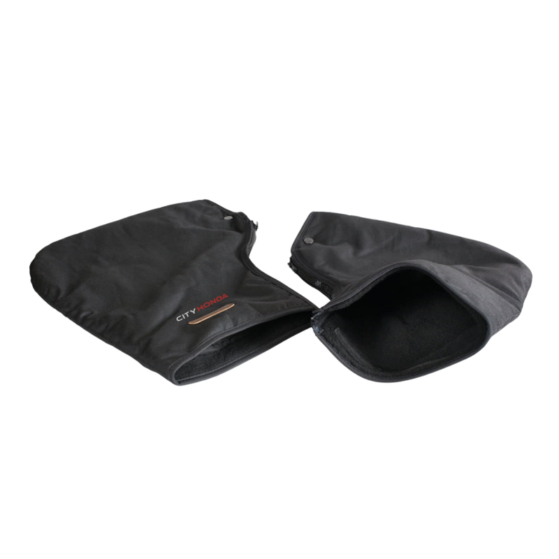A pair of black Oilskin Fur Lined ATV Mitts by STYX MILL, designed for scooters or bicycles, with inner fur lining. One mitt displays the "CITYHORN" label in red and white text, shown on a white background.