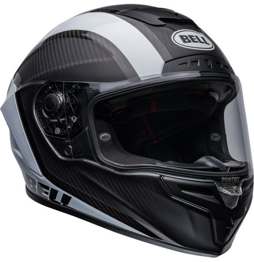 Side view of the Bell RACE STAR DLX FLEX Tantrum 2 Black/White helmet with a clear visor. The helmet boasts a sleek design with aerodynamic contours, Velocity Flow Ventilation, and a textured pattern on the top and sides. A Carbon Fiber Shell ensures durability, while the BELL logo is prominently displayed.