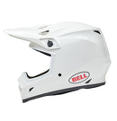 The Bell MX-9 MIPS White full-face helmet features a polycarbonate shell, visor peak, and the Velocity Flow ventilation system for comfort. The BELL logo in red and black adorns the side.