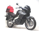 The Ventura EVO-12 Bike-Pack Kit for Aprilia ETV 1000 Caponord (01-06) includes a black EVO-12 pack, an Adjustable Pack-Rack for mounting, and L-Brackets with screws—shown in a representative image.