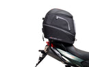 The Ventura EVO-12 Bike-Pack Kit for the Aprilia Shiver 900 (2019) includes a sleek black pack, an Adjustable Pack-Rack for bike mounting, and an L-Bracket with screws for secure attachment.
