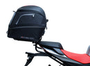 The image shows the EVO-12 Bike-Pack Kit by Ventura for Aprilia Tuono 660, RS660 (21 ->). It includes a black expandable bike pack, an Evo-Rack with Pannier Support, and a generic L-bracket and hardware. Each component is labeled: EVO-12 Pack, Adjustable Pack-Rack, and L-Bracket.