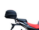 The image shows the EVO-12 Bike-Pack Kit by Ventura for Aprilia Tuono 660, RS660 (21 ->). It includes a black expandable bike pack, an Evo-Rack with Pannier Support, and a generic L-bracket and hardware. Each component is labeled: EVO-12 Pack, Adjustable Pack-Rack, and L-Bracket.