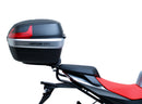 The image shows the EVO-12 Bike-Pack Kit by Ventura for Aprilia Tuono 660, RS660 (21 ->). It includes a black expandable bike pack, an Evo-Rack with Pannier Support, and a generic L-bracket and hardware. Each component is labeled: EVO-12 Pack, Adjustable Pack-Rack, and L-Bracket.