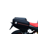 The image shows the EVO-12 Bike-Pack Kit by Ventura for Aprilia Tuono 660, RS660 (21 ->). It includes a black expandable bike pack, an Evo-Rack with Pannier Support, and a generic L-bracket and hardware. Each component is labeled: EVO-12 Pack, Adjustable Pack-Rack, and L-Bracket.