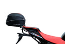 The image of the EVO-12 Bike-Pack Kit reveals three stylish components for the Aprilia Tuono V4 Factory (21 ->): a black pack with red accents, an EVO-Rack metal rack perfect for top-boxes, and versatile L-Brackets with screws. They’re ideal for customizing your adjustable Ventura pack-rack setup.