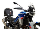 The Ventura EVO-12 Bike-Pack Kit for the Aprilia Tuareg 660 (22 - >) includes a sleek pack, durable Evo-Rack, and L-bracket with screws for easy installation, ensuring secure storage and convenient access on your bike journeys.