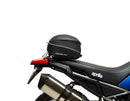 The Ventura EVO-12 Bike-Pack Kit for the Aprilia Tuareg 660 (22 - >) includes a sleek pack, durable Evo-Rack, and L-bracket with screws for easy installation, ensuring secure storage and convenient access on your bike journeys.
