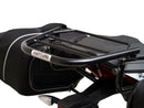Ventura Aprilia Tuono V4 1100 (21 - >) Bike-Pack Kit shown with labeled images: EVO-12 Pack (soft black bag), EVO-Rack Top-Box Rack (metal bike-mounted rack), and generic L-Bracket plus mounting hardware.