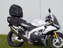 Ventura Aprilia Tuono V4 1100 (21 - >) Bike-Pack Kit shown with labeled images: EVO-12 Pack (soft black bag), EVO-Rack Top-Box Rack (metal bike-mounted rack), and generic L-Bracket plus mounting hardware.