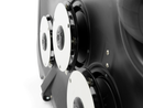 Close-up of three Husqvarna CEORA® Cutting disc M components—black-and-white, circular, and mounted with visible screws on a dark surface—part of an industrial or electronic device with a smooth finish.