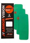 Three green lens protectors are shown beside black and orange Armor Vision packaging labeled “ARMOR VISION SMARTFILM 50MM (PACK OF 3),” featuring a tear-off replacement system and retro-fit lens protector promotion.