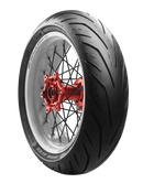 The Avon Storm 3D X-M tires by Avon Tyres are displayed against a black background, featuring high-performance black tread and white rims. Their red hubs with visible spokes emphasize excellent wet grip capabilities, highlighting the tires' superior structure.