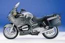 The image showcases the EVO-12 Bike-Pack Kit for BMW R 1150 RT (2001) by Ventura, featuring a stylish black bike-pack labeled "EVO-12 Pack," an "Evo-Rack" top-box rack, and an L-Bracket with screws for easy assembly, all set against a pristine white background.