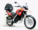 The Ventura EVO-12 Bike-Pack Kit for BMW G 650 GS (09-10) includes a black EVO-12 pack, rear Adjustable Pack-Rack for your motorcycle, and a generic image of a black L-Bracket with screws labeled "L-BRACKET.