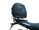Image of Ventura EVO-12 Bike-Pack Kit components, featuring a compact black EVO-12 pack with a sleek design and durable Adjustable Pack-Rack. It includes a labeled mounting plate for BMW R 1250 R, RS (19 - >), pannier support, versatile L-bracket, and complete mounting hardware and screws.