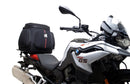 Image showing a Ventura EVO-12 bike-pack bag, metal Pack-Rack EVO-rack mounted on a BMW F 850 GS (19 - >) motorcycle, and an L-Bracket with screws labeled "Generic Image." Text: "EVO-12 Bike-Pack Kit.