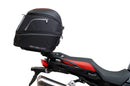 Image showing a Ventura EVO-12 bike-pack bag, metal Pack-Rack EVO-rack mounted on a BMW F 850 GS (19 - >) motorcycle, and an L-Bracket with screws labeled "Generic Image." Text: "EVO-12 Bike-Pack Kit.