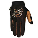The FIST BLACK TAN BREEZER GLOVE features a black design with brown accents and a stylized fist logo, perfect for MTB sports or outdoor activities, shown on a white background.