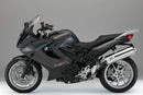 Ventura BMW F800 GT (13-20) EVO-12 Bike-Pack Kit shown with the EVO-12 pack, Top-Box Rack or Adjustable Pack-Rack on a motorcycle, plus a generic L-Bracket, screws, and metal parts.