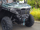 A rugged black Ventura CF Moto U10 Pro Highland is parked outdoors, featuring large tires, bull-bars, a front guard, two seats with headrests, and a winch on the bumper. Its towbar suggests hauling capability. Trees and grass surround the scene.