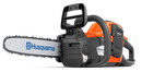 The Husqvarna 225i with battery and charger is an orange and black battery-powered chainsaw featuring a visible brand logo, black handle, silver blade, and rechargeable battery pack for high-performance cutting.
