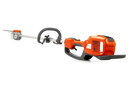 The Husqvarna 530iPX without battery and charger is a long-handled, orange and black battery-powered forestry clearing saw with ergonomic handles for professional performance and superior freedom of movement.