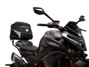 Image shows a Ventura EVO-12 Bike-Pack Kit for CF Moto 800 NK (23->), featuring a black EVO-12 pack, an adjustable metal Pack-Rack on the bike, and a generic L-bracket with mounting hardware.