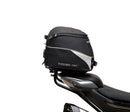Image shows a Ventura EVO-12 Bike-Pack Kit for CF Moto 800 NK (23->), featuring a black EVO-12 pack, an adjustable metal Pack-Rack on the bike, and a generic L-bracket with mounting hardware.