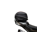 Image shows a Ventura EVO-12 Bike-Pack Kit for CF Moto 800 NK (23->), featuring a black EVO-12 pack, an adjustable metal Pack-Rack on the bike, and a generic L-bracket with mounting hardware.