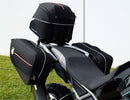 Ventura CF Moto 450 MT (24 - >) Bike-Pack Kit includes a black EVO-12 pack, Evo-Rack on the bike, and black L-Bracket with screws—text labels highlight each part, demonstrating the Adjustable Pack-Rack system's versatility.