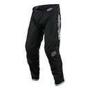 The Troy Lee Designs GP PANT MONO BLACK features breathable fabric, reinforced knees, a white side logo, waist closure, visible seams for durability, and a tapered fit—ideal motocross riding gear.
