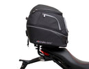 The Ducati 821 Monster (17-21) kit by Ventura showcases a stylish black bike pack with a red stripe and "EVO-12 PACK" label, plus the versatile "EVO-RACK" top-box rack. It includes sturdy L-BRACKET mounts with screws and fittings for secure attachment.