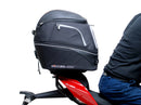 The EVO-12 Bike-Pack Kit for the Ducati 1158 Streetfighter V4/V4S (20 ->) by Ventura includes a black pack with an orange stripe, an adjustable Pack-Rack for seamless bike attachment, and a detailed L-Bracket with screws, all showcased in a generic image.