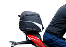 The EVO-12 Bike-Pack Kit for the Ducati 1158 Streetfighter V4/V4S (20 ->) by Ventura includes a black pack with an orange stripe, an adjustable Pack-Rack for seamless bike attachment, and a detailed L-Bracket with screws, all showcased in a generic image.