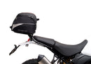 Image of a Ducati DesertX (22 - >) by Ventura featuring a sleek black EVO-12 Bike-Pack with an orange stripe, complemented by the versatile Top-Box Rack and an L-Bracket. Each component is clearly labeled: "EVO-12 Pack," "Top-Box Rack," and "L-Bracket (Generic Image).