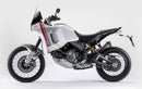 Image of a Ducati DesertX (22 - >) by Ventura featuring a sleek black EVO-12 Bike-Pack with an orange stripe, complemented by the versatile Top-Box Rack and an L-Bracket. Each component is clearly labeled: "EVO-12 Pack," "Top-Box Rack," and "L-Bracket (Generic Image).