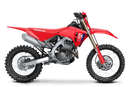 The 2025 Honda CRF250RX is a red off-road bike featuring a sturdy frame, knobby tires, and a black seat. It includes front and rear suspension with visible springs and displays prominent "Honda" branding on the side. The motorcycle is presented against a plain backdrop.