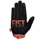 The FIST DUSK GLOVE is a single motocross glove with a pink cuff, gradient fade to gray fingers, "FIST" on the knuckles, and a bold raised fist graphic on the back of the hand.