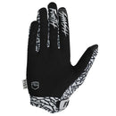 The ELEPHANT GLOVE by FIST is a single motocross glove featuring a black and white abstract pattern, "FIST" lettering on the fingers, a bold shield logo on the back, and a small branded side tag.