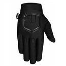 The BLACK STOCKER GLOVE by FIST is a black BMX glove featuring "FIST" lettering on the knuckles, a raised fist emblem on the back, and a "FIST" tag near the cuff, displayed against a white background.