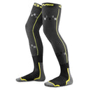 The EVS Sports FUSION SOCK / SLEEVE COMBO | HI-VIS offers black compression sleeves with yellow accents, gray foot sections, and geometric square patterns near the knee, extending from foot to upper thigh for full coverage.