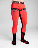 The FUSION SOCK / SLEEVE COMBO | 40TH ANNIVERSARY by EVS Sports is a pair of black and red compression leg sleeves with socks attached, featuring Trac Grip technology. Branding and design details in black appear on the red sections.