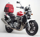 The image showcases the Ventura EVO-12 Bike-Pack Kit, featuring a black pack with orange accents. Featured items include the metal Evo-Rack secured to a Honda CB 1300 S (05-09) and L-Bracket set with screws, all complementing the versatile Top-Box Rack, labeled as a generic image.